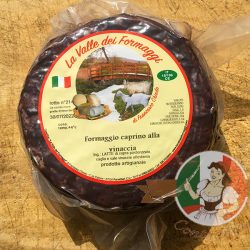 Formaggio Caprino alle Vinacce - ser kozi dojrzewający w wytłokach winnych z czerwonych winogron